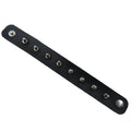 Black leather bracelet with silver studs on a white background