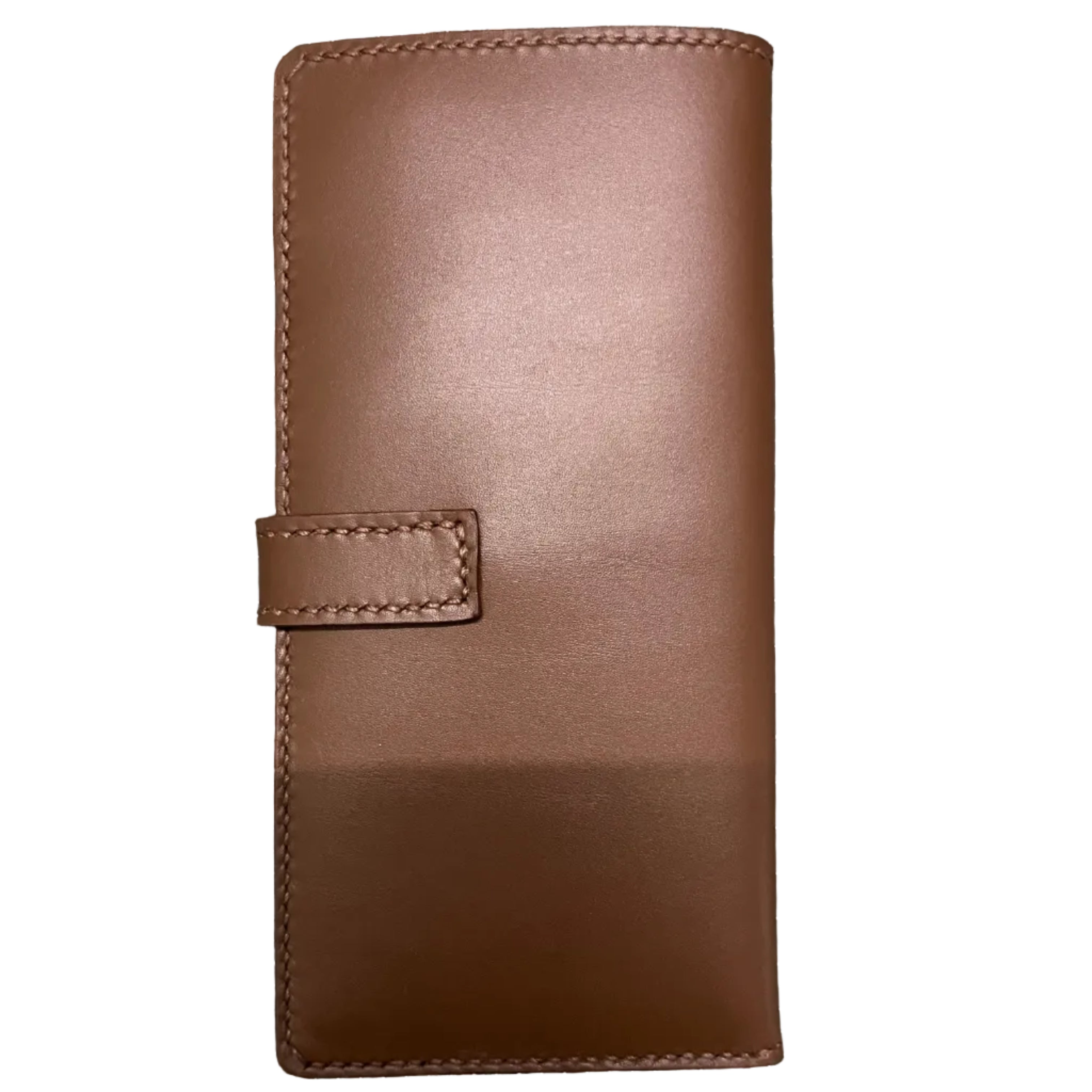 Brown leather wallet on a green grid background