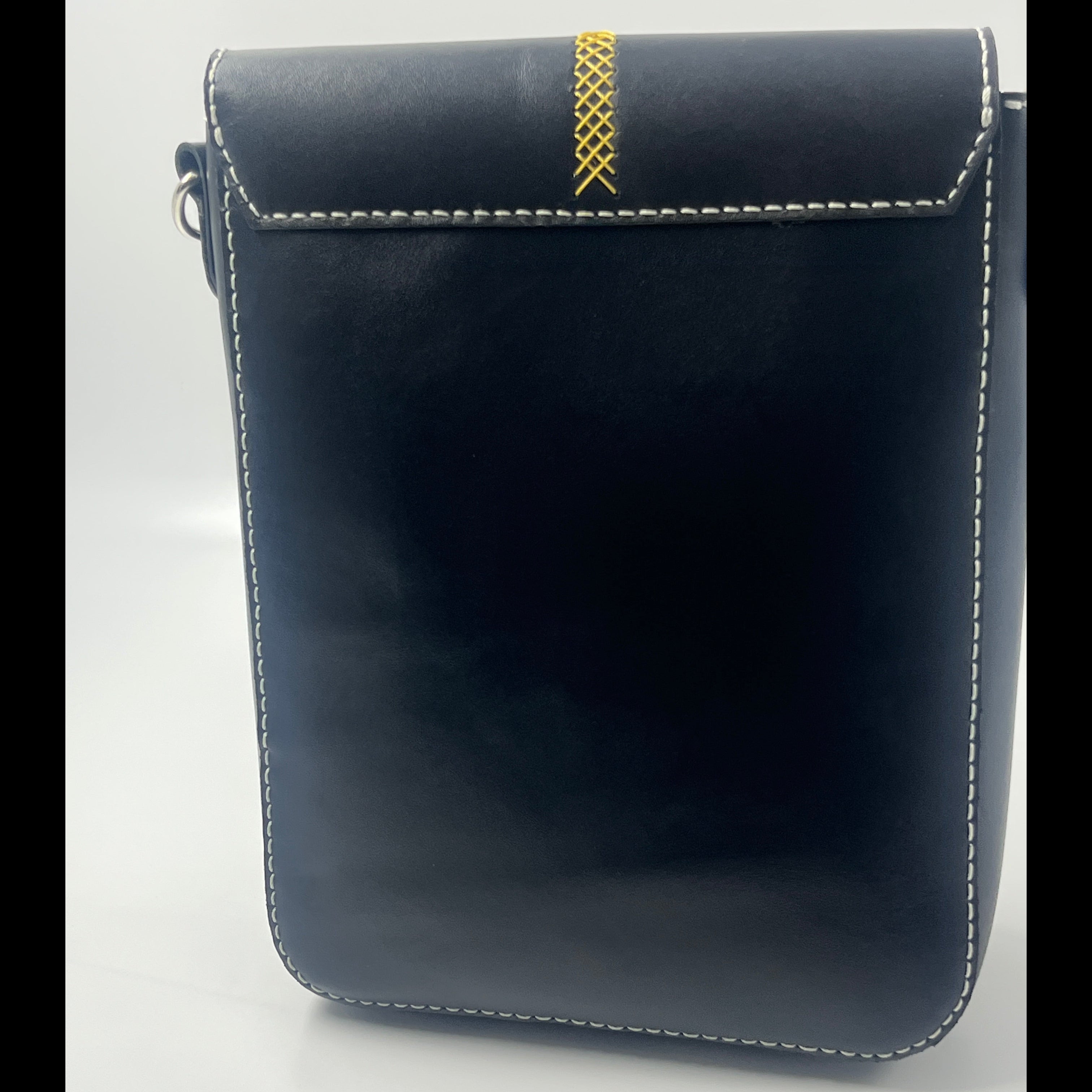 Black leather wallet with gold stitching on a white background