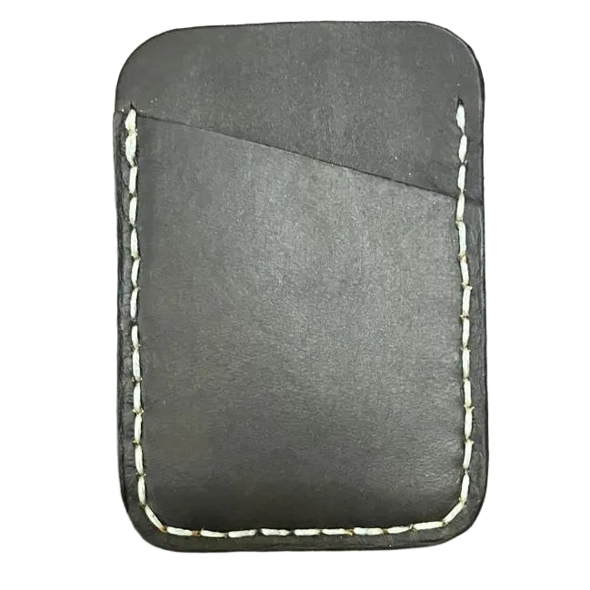 Black leather cardholder with white stitching on a wooden surface